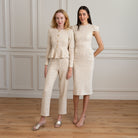 tweed jacket featuring long sleek sleeves with gold buttons and closed round neck paired with pant